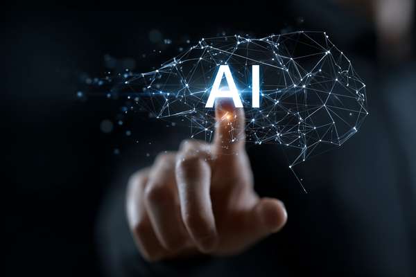 AI技術に触れる指先とネットワーク